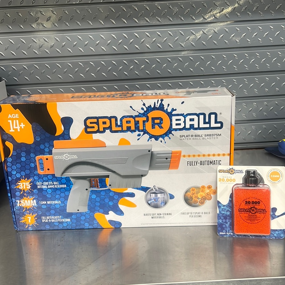 Splat r ball gun brand new in box never used and 20,000 water bullets